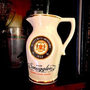 Vintage 1975 Old Smuggler, Scotch Whisky Pitcher, with 22kt gold trim.